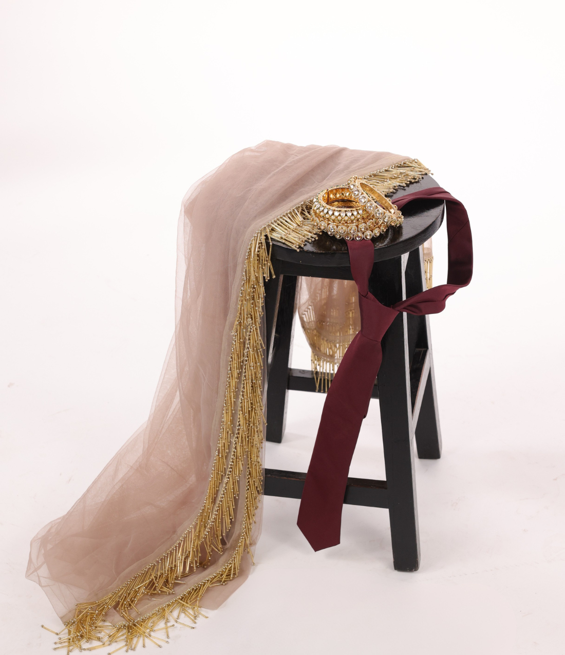 Fusion wedding accessories on a stool